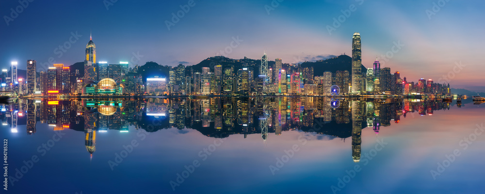 Panorama of Victoria Harbor in Hong Kong at dusk - obrazy, fototapety, plakaty 