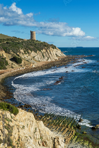 Paisaje costero con la torre de Guadalmesi de fondo en Guadalmesi, Tarifa, Provincia de Cadiz, Andalucia, España photo