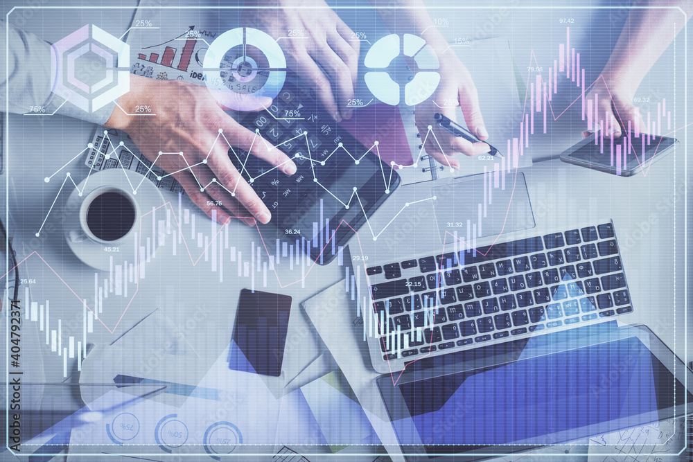 Double exposure of man and woman working together and financial chart hologram drawing. market analysis concept. Computer background. Top View. Double exposure of man and woman working together and financial chart hologram drawing. market analysis concept. Computer background. Top View.
