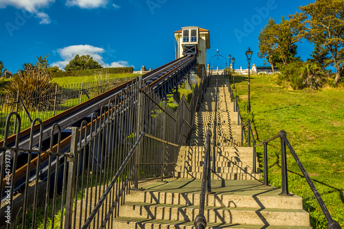 Steps and a funicular chair lift head up the cliffs away from the beach at Southend-on-Sea, UK in Autumn photo