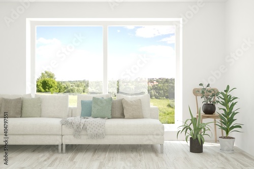 White living room with sofa and summer landscape in window. Scandinavian interior design. 3D illustration
