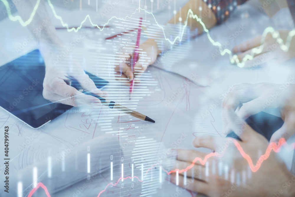 Double exposure of forex graph drawing and man and woman working together holding and using a mobile device. Trade concept. Double exposure of forex graph drawing and man and woman working together holding and using a mobile device. Trade concept.