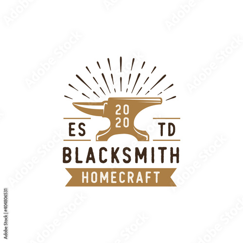 Blacksmith iron anvil foundry vintage logo design photo