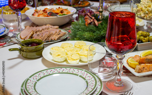 Served table. Waiting for the holiday. Snacks and salads on the table.