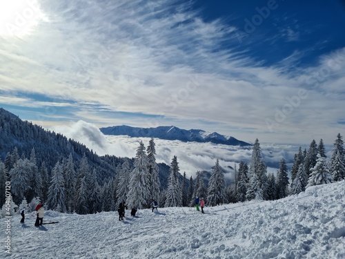 Winter time with lens glare at Poiana Brasov ski resort in Romania