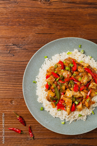 Chicken kung pao. Fried chicken pieces with peanuts and peppers.