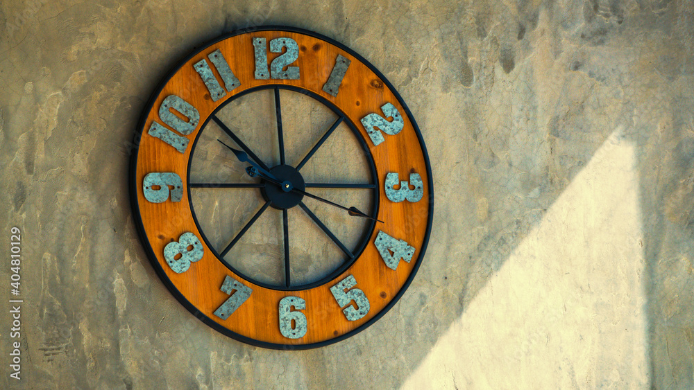 Clock on the concrete wall