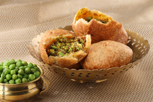 matar kachori or kacchori or kachodi is a fried rajasthani teatime snack stufed with green peas photo