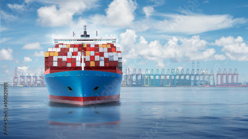 Fototapeta Naklejka Na Ścianę i Meble -  Front view from bow of a large blue shipping container ship with port harbour and container terminal on a horizon.