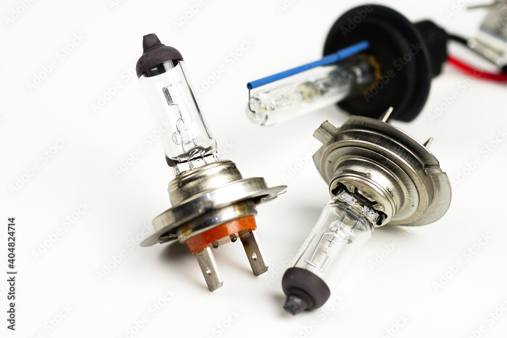 A car headlight bulb on a white background.Hydrogen tube, Xenon tube. A car headlight bulb on a white background.Hydrogen tube, Xenon tube.