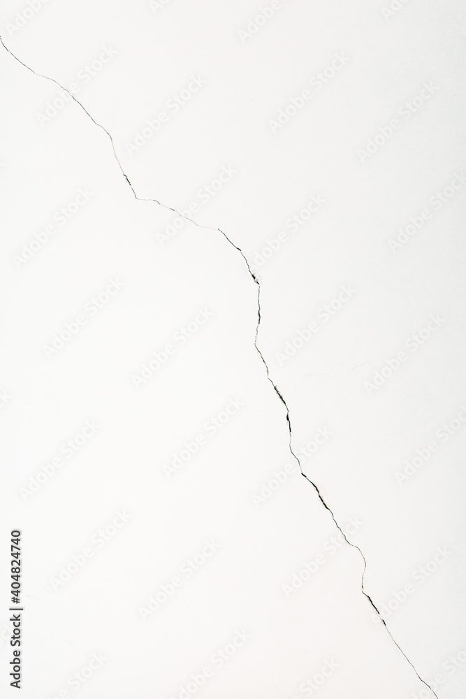 Fotografie Old wall with crack as a constructing background with copy space