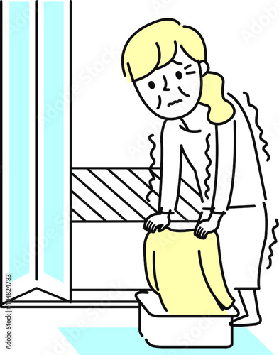 シニア女性寒い脱衣所