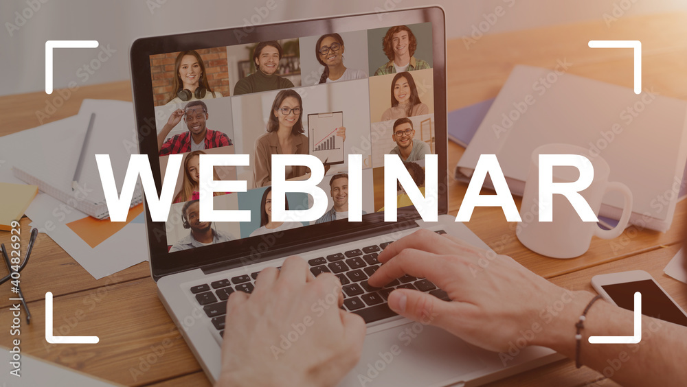 © Prostock-studio - Hands typing on a laptop in modern office, webinar text