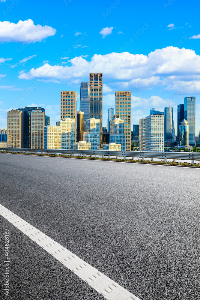 Asphalt road and modern city commercial buildings in Beijing,China.