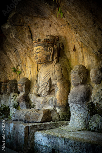 Photograph of Usuki Stone Buddha, a national treasure of Japan photo