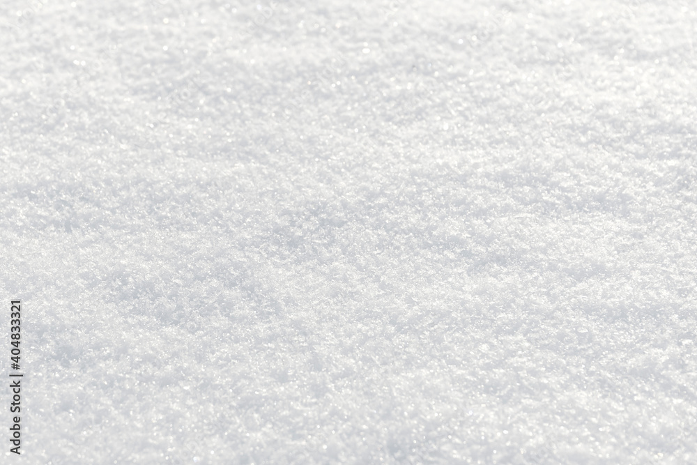 White clean shiny snow background texture. fresh snow  seamless texture. snowy surface closeup