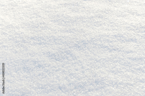 White clean shiny snow background texture. fresh snow  seamless texture. snowy surface closeup © Илья Подопригоров