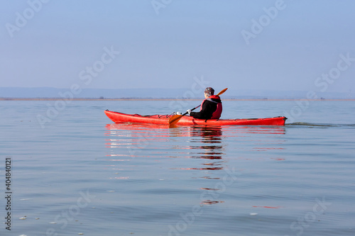 Kayak trip on the lake at winter season