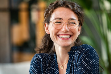 Natural young woman laughing