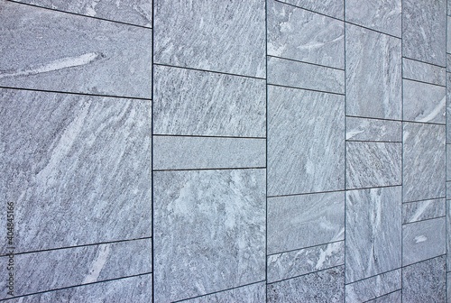 New grey paving made with stone blocks of rectangular shape in a pedestrian zone