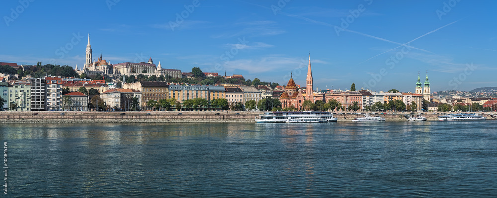 Budapest, Hungary. Panoramic view of right bank of Danube with Matthias Church and Fisherman's Bastionon on Castle Hill, Calvinist Church faced to Danube, and St. Anne Parish Church.