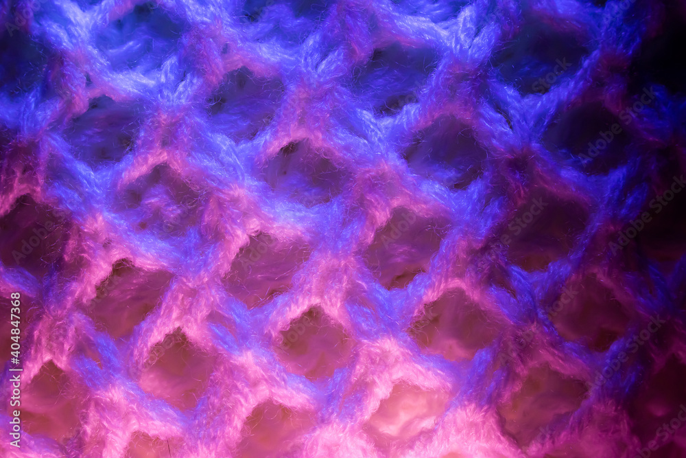 Close-up of fluffy soft textile. Abstract fabric with knit texture for background.. Close-up of fluffy soft textile. Abstract fabric with knit texture for background..