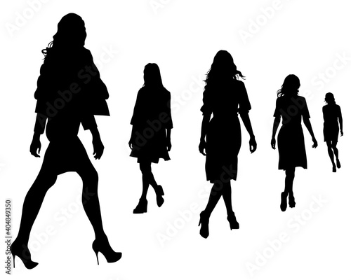 Beauty young girl in dress walking down street. Isolated silhouette on white background