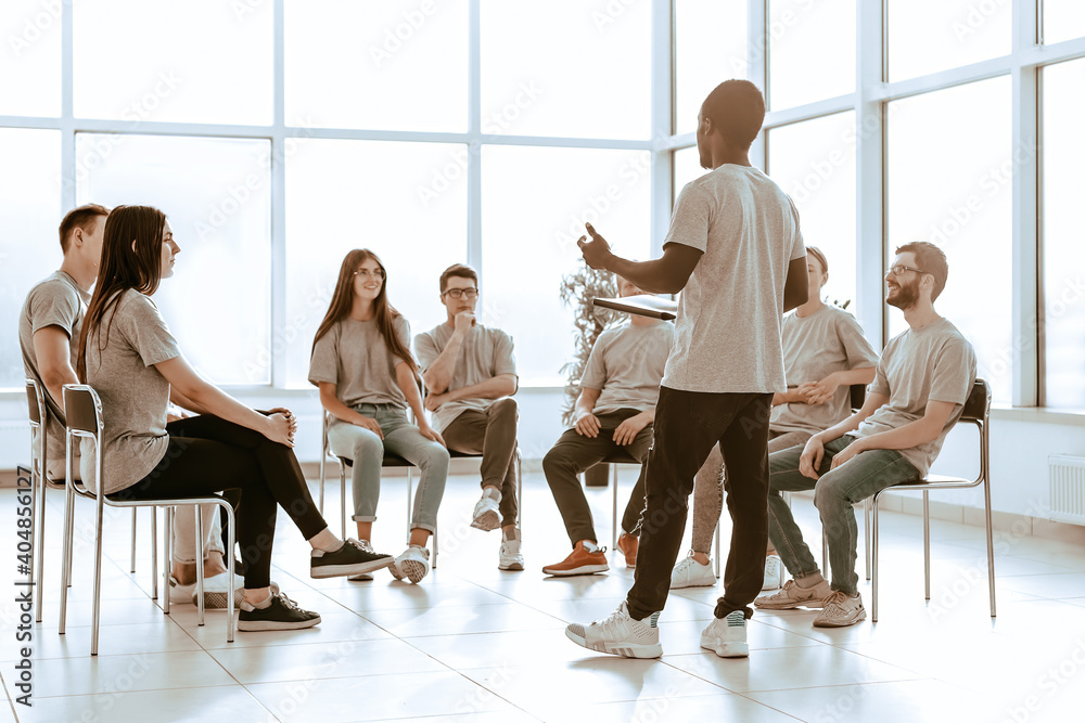 group of young people at a seminar in the conference room