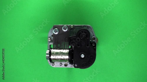 Close up shot with Mechanism of Musical box on green screen