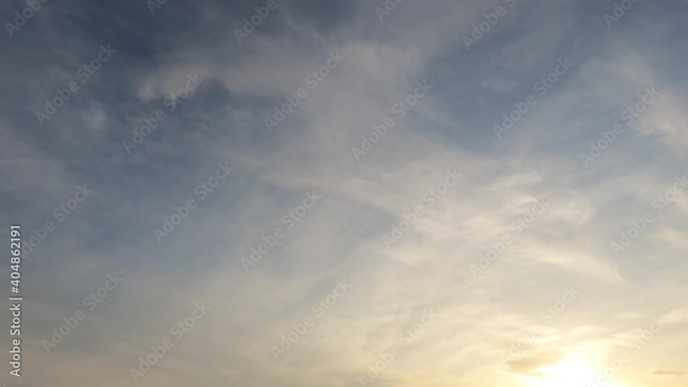 Bright sun light ray n sunbeam flare shining through dramatic golden gray cirrus cloud n beautiful sunny white cumulus cloudscape on Sunrise blue sky background, 4k cinemagraphs b-roll TimeLapse Bright sun light ray n sunbeam flare shining through dramatic golden gray cirrus cloud n beautiful sunny white cumulus cloudscape on Sunrise blue sky background, 4k cinemagraphs b-roll TimeLapse