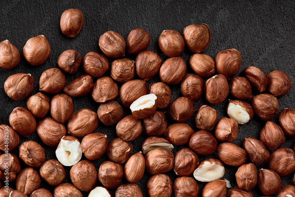 Close up of Hazelnut kernels - Food Frame Background, macro detailed close up. Close up of Hazelnut kernels - Food Frame Background, macro detailed close up.