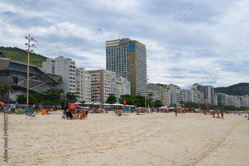  Citizens sunbathe on the beach of Copacabana © Aleksandr