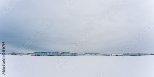 Totenåsen Hills in Norway seen from the lowlands in winter. photo