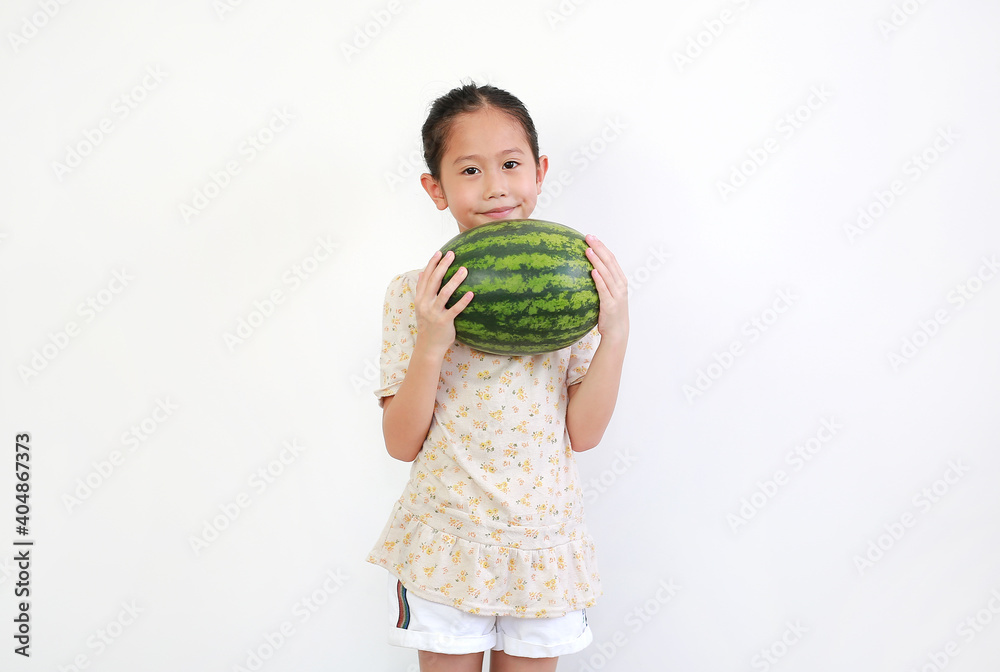 Portrait of asian little girl holding fresh green watermelon isolated on white background. Portrait of asian little girl holding fresh green watermelon isolated on white background.