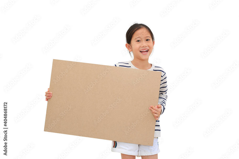 Smiling asian little girl holding empty brown big board for media banner isolated on white background with copy space Smiling asian little girl holding empty brown big board for media banner isolated on white background with copy space