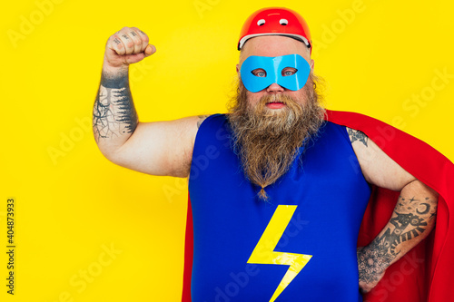Print op canvas Funny man wearing a superhero costume