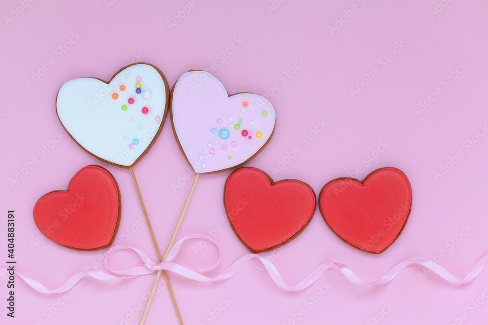 Valentine heart cookies for Valentine's day or Mother's day on pink background.