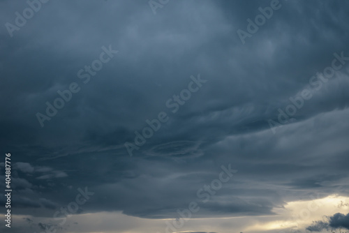 Large dark stormy cumulonimbus cloud