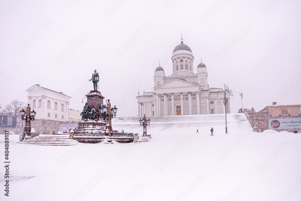 Helsinki, Finland. January 12, 2021 White Church. Heavy snowfall, hurricane, The front staircase is covered with snow near the Cathedral