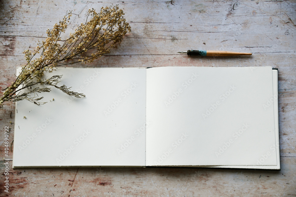 Blank journal open for creative writing or journaling art activities - obrazy, fototapety, plakaty 