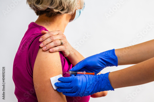 Vaccinating elderly people. Health care and medical prevention.