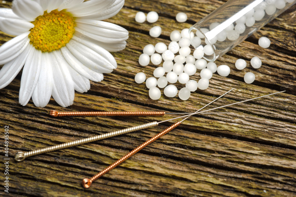 alternative medicine with acupuncture and herbal pills