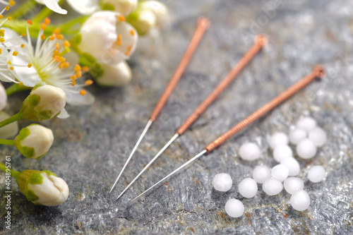 alternative medicine with acupuncture and herbal pills