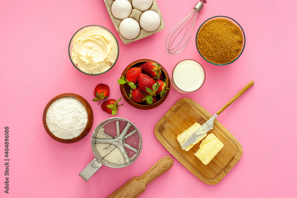 .Making strawberry pie for valentine's day. Products for the pie are flour, sugar, butter and strawberries. .Making strawberry pie for valentine's day. Products for the pie are flour, sugar, butter and strawberries.