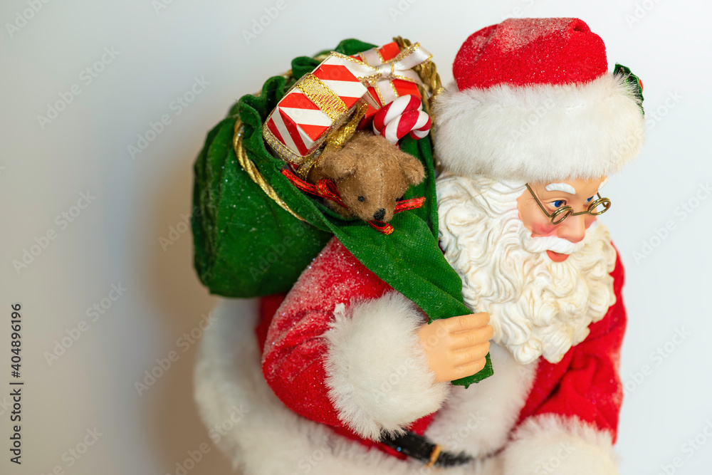 Fototapeta premium santa claus and christmas tree