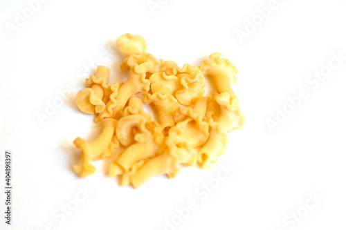 Pasta campanelle not cooked, isolated on a white background