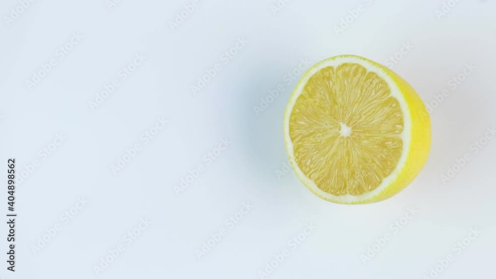 Fresh lemons rotating in a circle, white background, and space for text. Fresh lemons rotating in a circle, white background, and space for text.