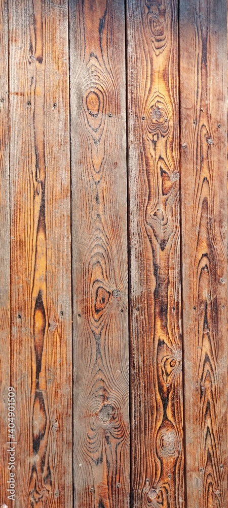 Obraz premium Backgrounds and textures: wooden surface covered with brown stain. Space for text.