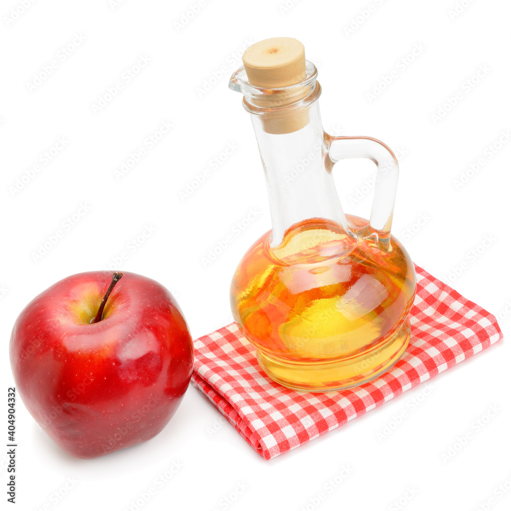 Apple vinegar in glass bottle isolated on white Apple vinegar in glass bottle isolated on white