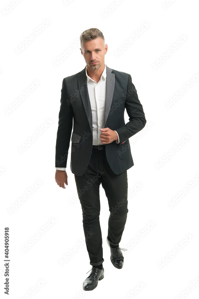 Putting on his business face. Businessman wear suit. Business professional capsule wardrobe Putting on his business face. Businessman wear suit. Business professional capsule wardrobe